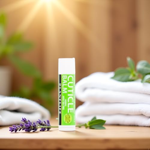 Applying Plantlife herbal cuticle balm to fingernails