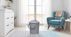 Rotho Babydesign Bella Bambina Nappy Pail placed next to nursery changing station