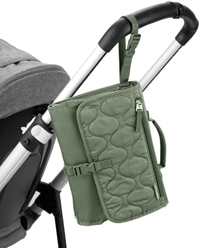 Skip Hop changing station showing mesh diaper storage pocket