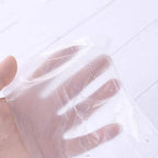 Compact portable packaging of plastic seat protectors inside a travel bag