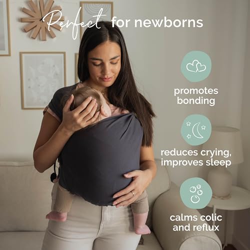 Side profile of a newborn seated ergonomically in the Boba Bliss hybrid sling
