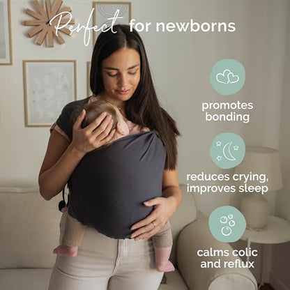Side profile of a newborn seated ergonomically in the Boba Bliss hybrid sling