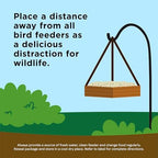 Kaytee wildlife food blend poured in a ground feeder