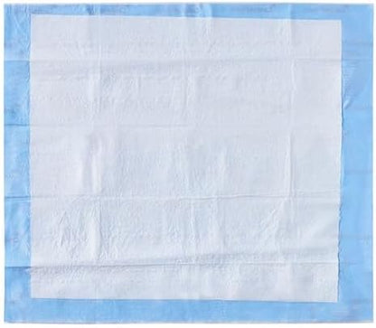 Blue waterproof backsheet of Cardinal Health heavy duty disposable bed pad demonstrating large coverage