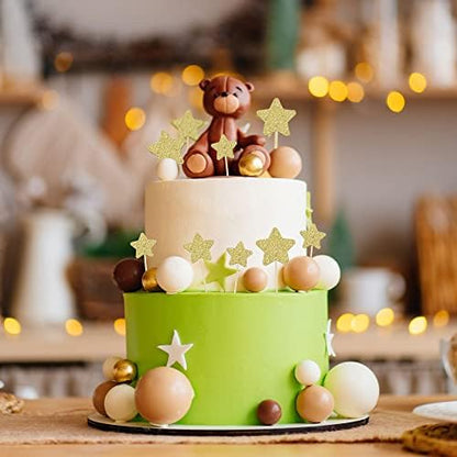 Gyufise star toppers inserted into dessert for baby shower theme