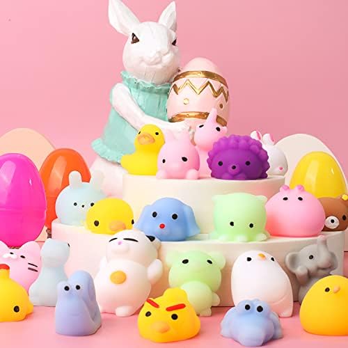 Close up view of a child gently squeezing a soft white unicorn mochi toy for sensory stress relief.