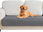 PAWFINITY pee proof pet blanket protecting a living room couch from mud
