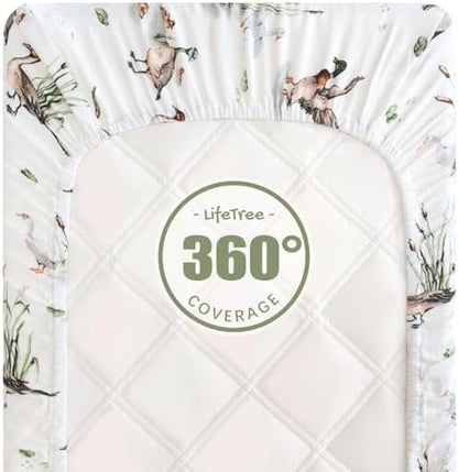 The elegant mallard duck print design on the breathable muslin infant diaper changing surface.