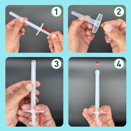 EZY DOSE dog and cat pill shooter being prepared for medicine administration.