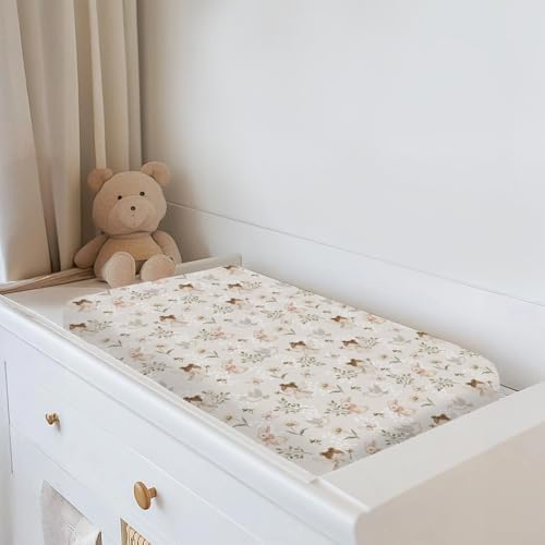 The ZoUbqchY changing pad cover installed on a nursery dresser station.
