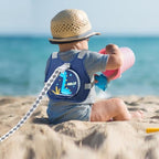 Toddler wearing Accmor dinosaur harness outdoors