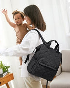 Lovevook mini travel backpack worn by parent demonstrating size