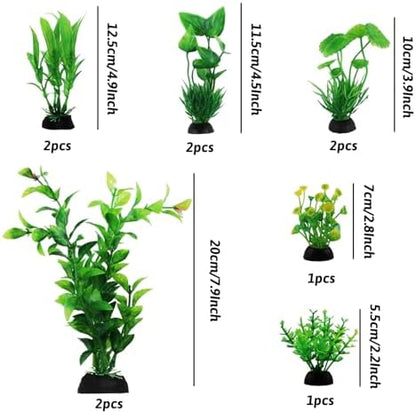 QUOZUO green plastic fish tank decorations illustrating the weighted heavy bases close up.