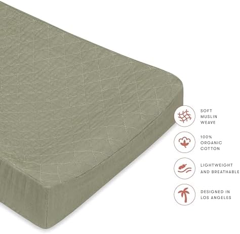 Premium imported organic cotton nursery bedding cover stretched on a changing mattress