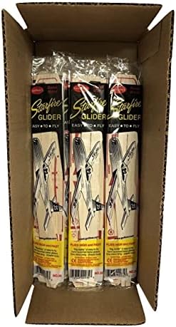 A full pack of eight individual balsa wood stunt glider kits neatly arranged to showcase the pre-cut parts and retro packaging graphics.