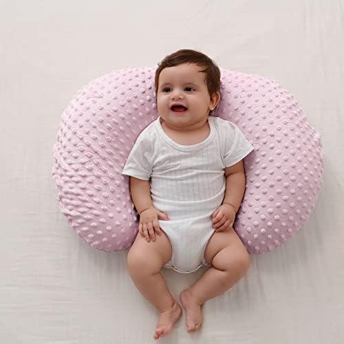Close up of soft minky dot texture on Queness Baby pillow slipcover