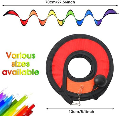 Close up of vibrant rainbow fabric spiral wind spinner