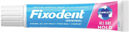 Fixodent secure hold denture cream tube demonstrating correct thin strip application