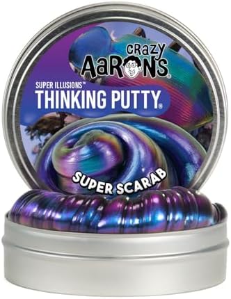 Close up of the metallic copper and red tones visible in the therapeutic hand putty under natural light.