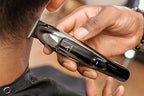 Side profile of Andis 562888 Slimline Pro II with ergonomic design