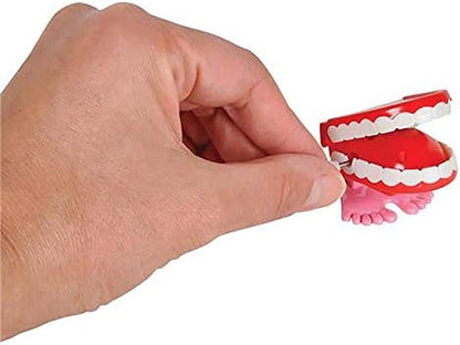 Compact 1.75 inch mechanical party favor toys showing the detailed pink gums design