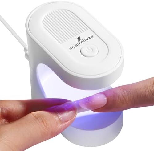 BTArtboxnails portable UV LED nail dryer showcasing top power button and USB plug placement.