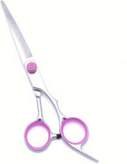 PAWCHIE pet grooming kit highlighting the adjustable tension screw and pink ergonomic finger rings.