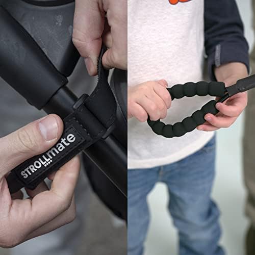Toddler holding Strollmate safety tether handle