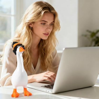 Magnetic goose statue wearing decorative hat and outfit