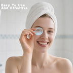 Hand squeezing the flexible silicone base of an eye wash cleaner tool.