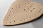 German engineered moss rubber arch inserts for orthopedic shoe support.