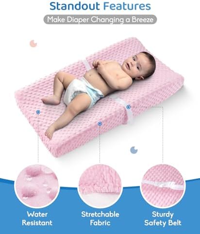 Loonah contoured baby changing pad showing safety strap and buckle