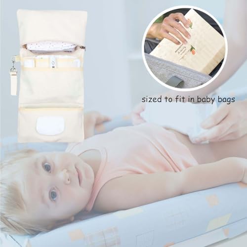 Interior compartments and pockets of the Modakids travel diaper organizer