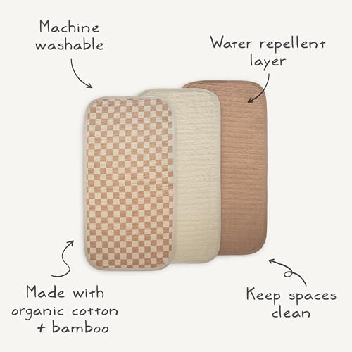 Close up of organic cotton texture on Mushie changing pad liner