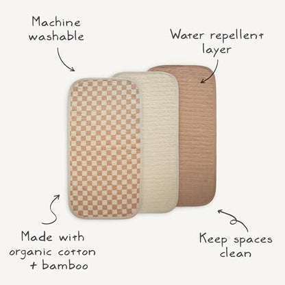 Close up of organic cotton texture on Mushie changing pad liner