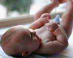 Close-up of the elephant blue pattern on newborn baby boy pee guards