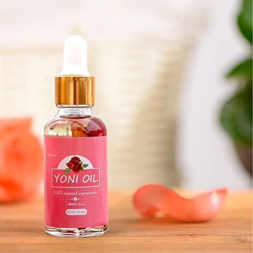 Natural rose essential oil serum bottle for intimate pH balance.