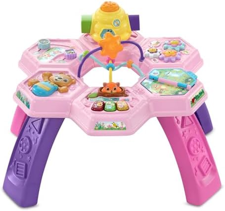 VTech toddler learning table tabletop view highlighting the seven interactive play zones and light-up buttons.