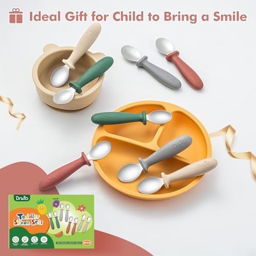 Toddler hand holding the DRKIO self feeding utensil demonstrating the comfortable kid friendly scale