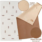 Waterproof faux leather surface of Owlowla changing pad