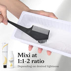 All in one DIY bleaching kit components featuring a blue powder pack, developer cream, tint bowl, and brush