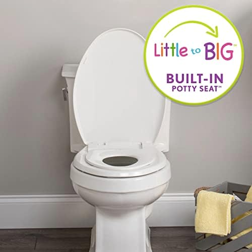Mayfair built in potty training toilet seat with child ring folded down.