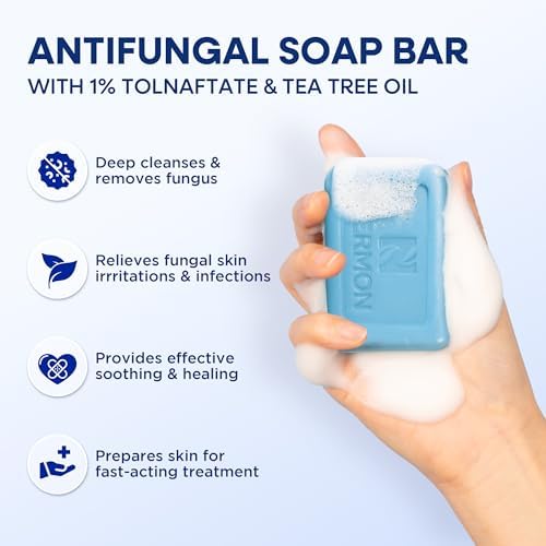 Dual action fungal treatment kit by Hermon containing liquid spray and cleansing bars.