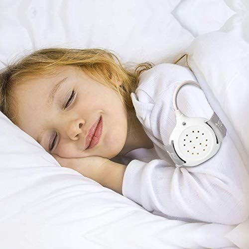 Child wearing the TEQIN alarm on arm for nighttime potty training.