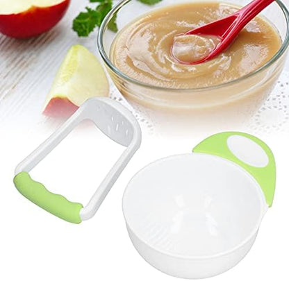 FTVOGUE baby food mash bowl set green being used to mash soft vegetables for weaning.