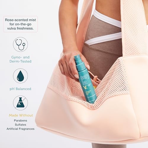 Say La V prebiotic vulva spray bottle showing spray nozzle and rosewater ingredients.