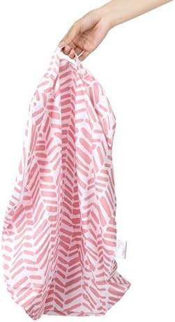Detailed view of pink herringbone pattern on premium baby cover