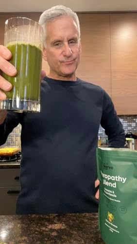 The Nerve Brand Neuropathy Superfood Blend powder texture in a scoop