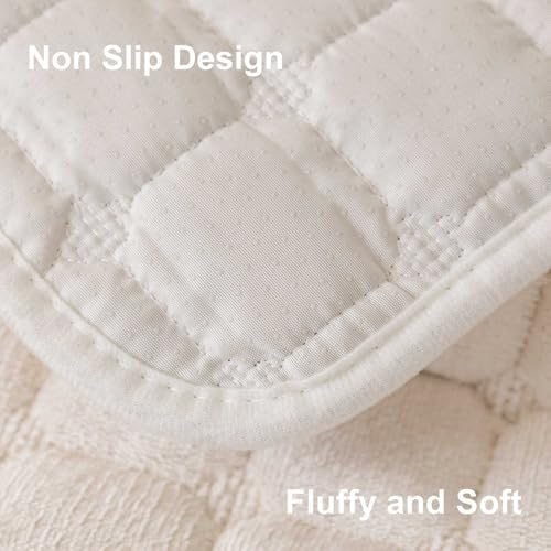 Aucrovee premium anti slip couch shield protecting white living room cushions.