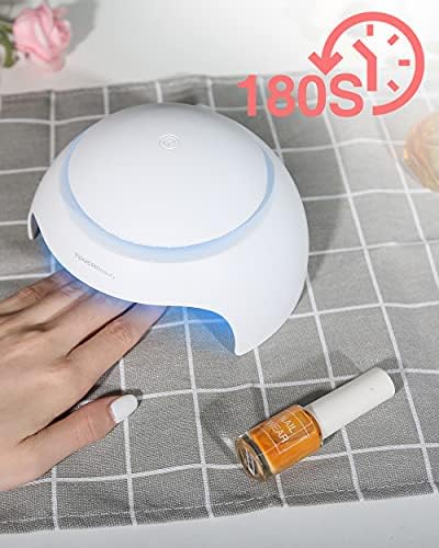 Touchbeauty portable nail dryer being used on fingernails